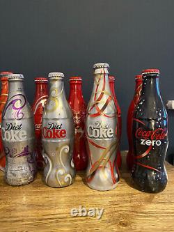 Collection of 76 Coke Bottles Limited edition Coca Cola Glass & Metal Bottles