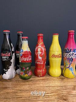 Collection of 76 Coke Bottles Limited edition Coca Cola Glass & Metal Bottles